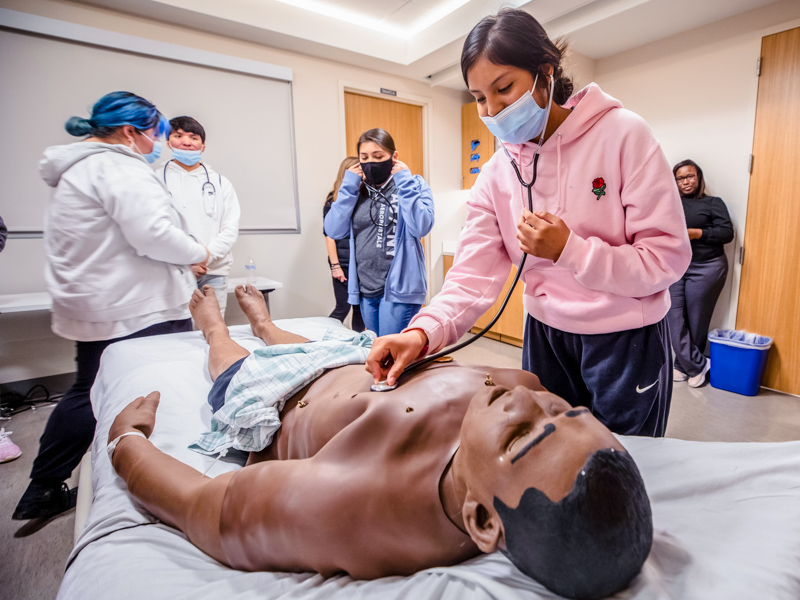 Choctaw Central High student Alexis Thomas makes sure that Stan's heart is still on the job. Jay Ferchaud/ UMMC Communications