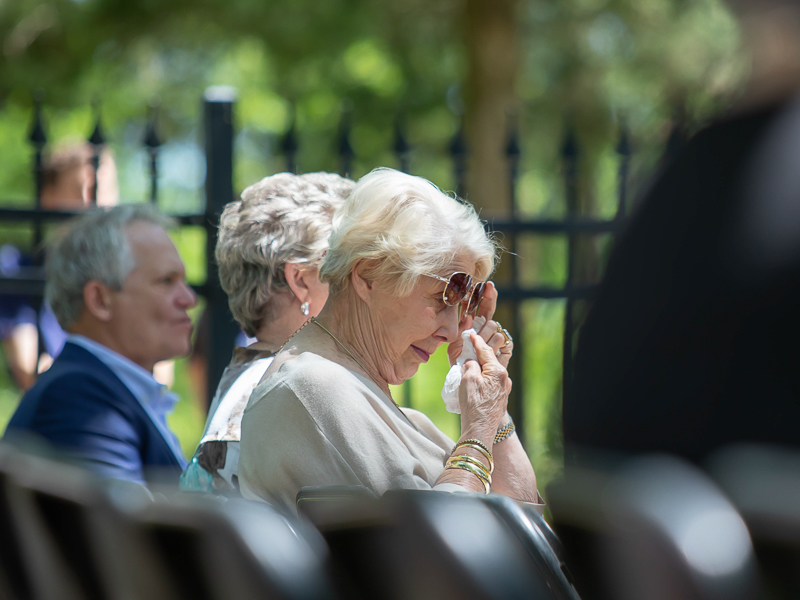 During a musical prelude, Iva Farmer of Hattiesburg remembers her husband, Ernest Zenker, who would have turned 94 on the day of the ceremony that honored him and more than 140 other donors.