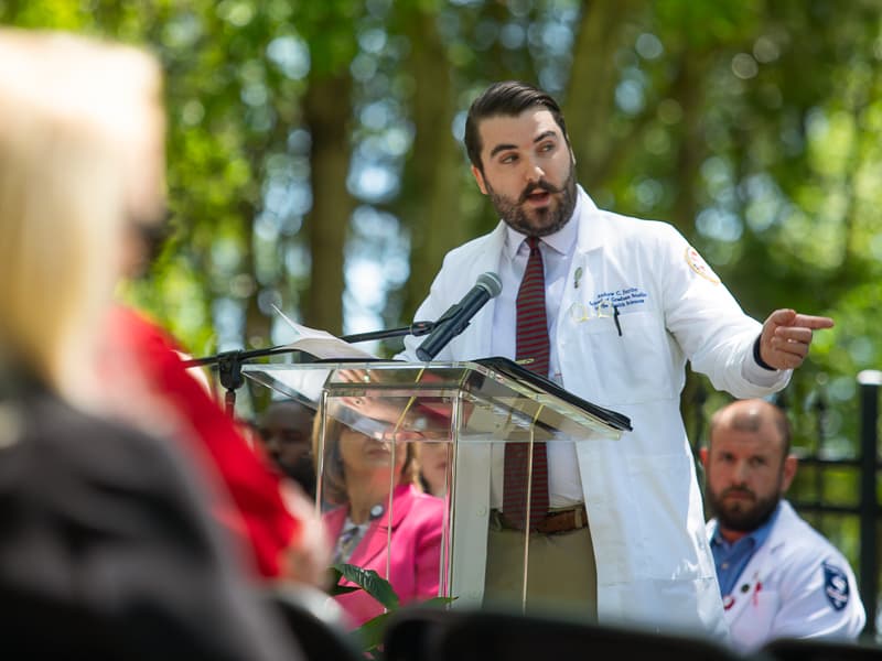 Andrew Ferriby of Flowood, a fourth-year clinical anatomy student in the School of Graduate Studies, reads the poem, "Confessions of a Second Year Medical Student," written several years ago by Katie Clifford, who was studying in the Brighton and Sussex Medical School in Brighton, England. "I knew more about your insides than I did of my own, but I didn't know what made you tick," it reads.