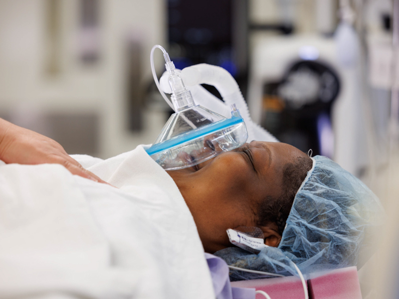 Tawanna Davis finds joy in the moment as she undergoes anesthesia before surgery to receive a live kidney donation from her son, Quinten Hogan. Joe Ellis/ UMMC Communications 