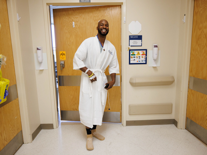 Quinten Hogan prepares to visit his next-door neighbor on 2 South in University Hospital: his mom, Tawanna Davis, who received Hogan's left kidney in a June 28 transplant surgery. Joe Ellis/ UMMC Communications 