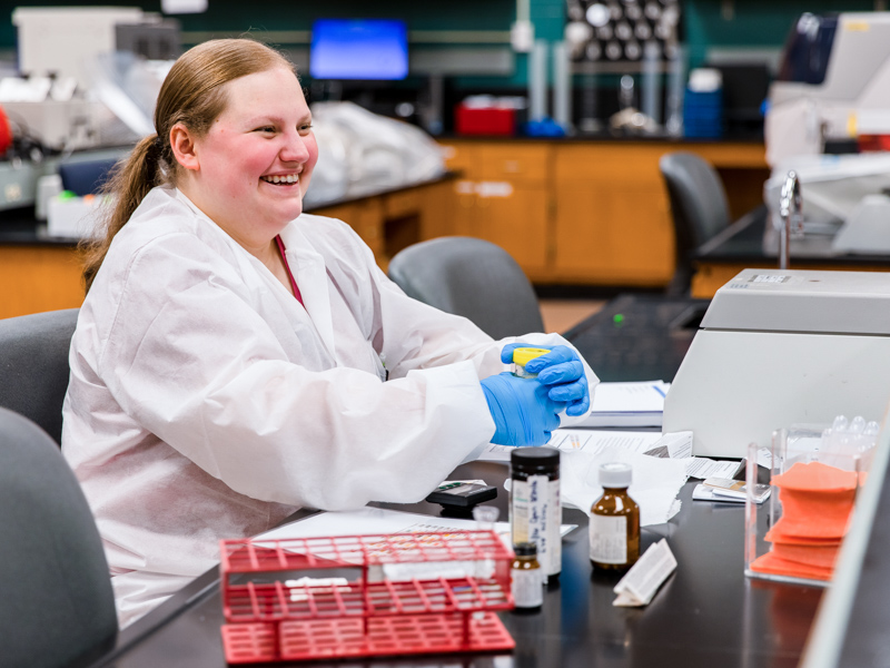 Medical Laboratory Science student Leanna Moore tests samples during a lab