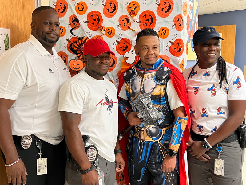 Members of the Behavioral Response Team of UMMC's Police and Public Safety Department stopped by the carnival at 3 Circle. From left are Officers Sharkey Ford and Garry Lee, Sgt. Shaun Hiley, and Officer Shanice Mays.