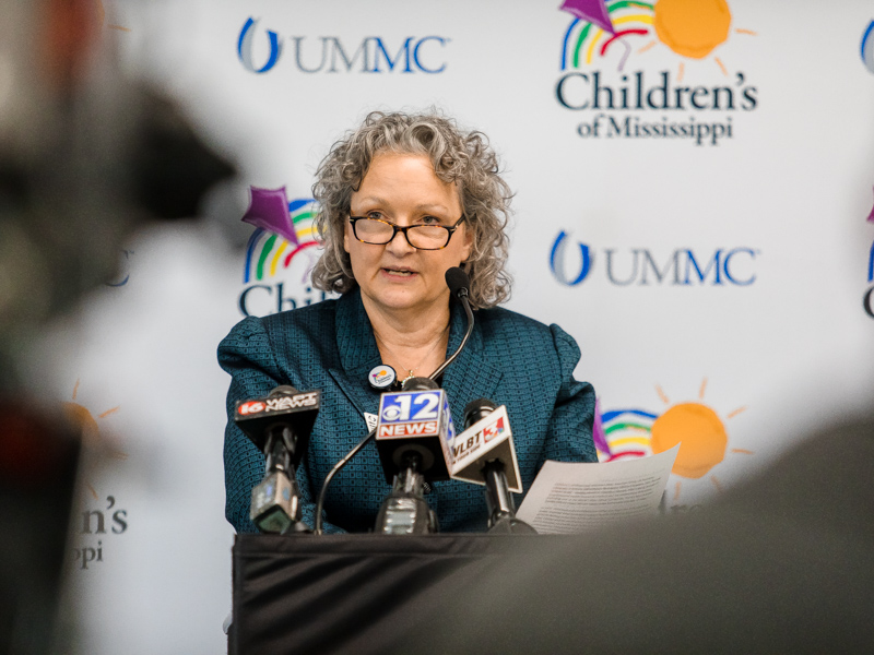 Children's of Mississippi Chief Nursing and Clinical Services Officer Ellen Hansen thanks Aflac and JSU Coach Deion Sanders for their support of the state's only children's hospital. Lindsay McMurtray/ UMMC Communications