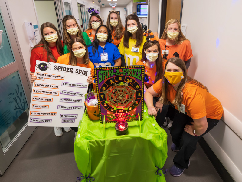 The PediaRebs student pharmacy club and child life specialits brought reverse trick-or-treating to Children's of Mississippi. Pictured are PediaRebs, from left, Lauren Thaw, Izzabella Christian, Emily Nichols, Katrina Nueva and Carly Cappleman, center, and child life specialists, center from left, Ashley Prendez, Anne Elizabeth Zegel, upper right, Cara Williams and Courtney Easterday. Melanie Thortis/ UMMC Communications 