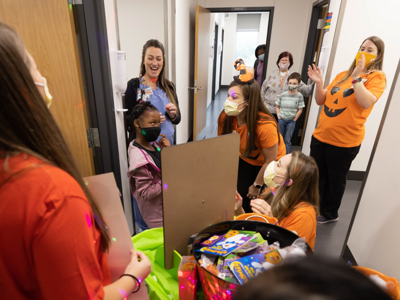 Children's of Mississippi nurses and child life specialists play Halloween games with patients inside the Kathy and Joe Sanderson Tower. Melanie Thortis/ UMMC Communications 