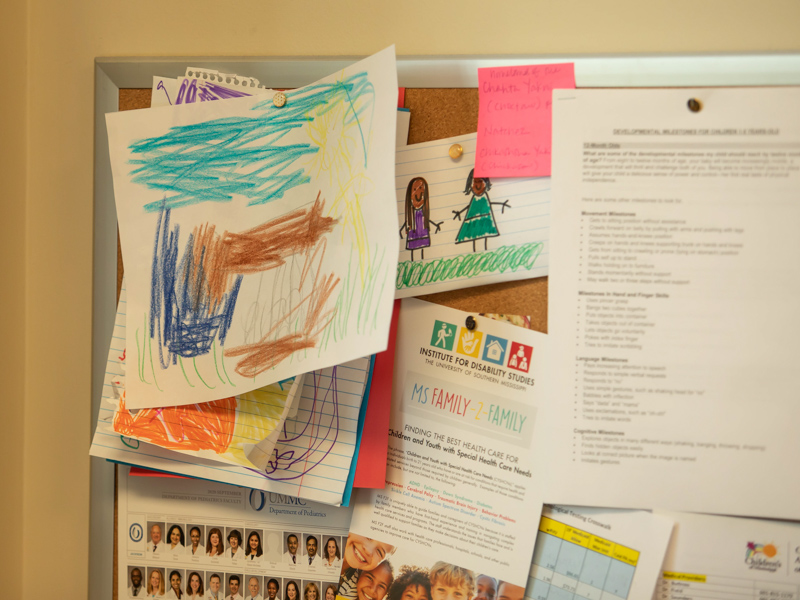 The artwork in Banks' office features crayon drawings by some of her favorite artists: her patients.