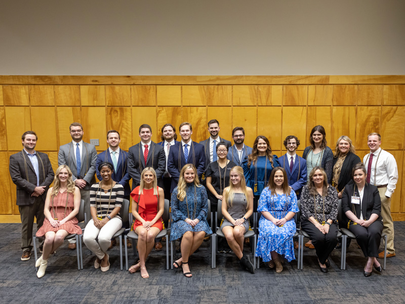 Among the 2022-2023 Phi Kappa Phi initiates and their UMMC schools are, seated, from left: Cara Pridmore (medicine), Amia Green (medicine), Shelby McCraw (nursing), Onsby Vinson (nursing), Sara Kennedy (nursing), April Lawler (nursing), Jackie Von Robke (nursing) and Kathryn Bennett (health related professions); standing, from left: Wilson R. Heath (medicine); Zachary Klopman (medicine), Andrew Burks (medicine), Tyler Weeks (dental), Tyler McGee (medicine), Landon Wilson (dental), Niall Mehaffey (medicine), Casey Park (dental), John Williams (population health), Wendi McLendon (nursing), Patrick McDaniel (medicine), Anna Solomon (nursing), Jeanna Wilkes (health related professions) and Presley Williamson (nursing).