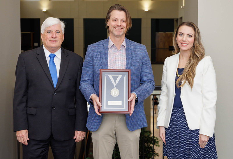 Bronze Award recipient Dr. Christopher Spankovich, center. Recipient Dr. Joseph Majure is not pictured.