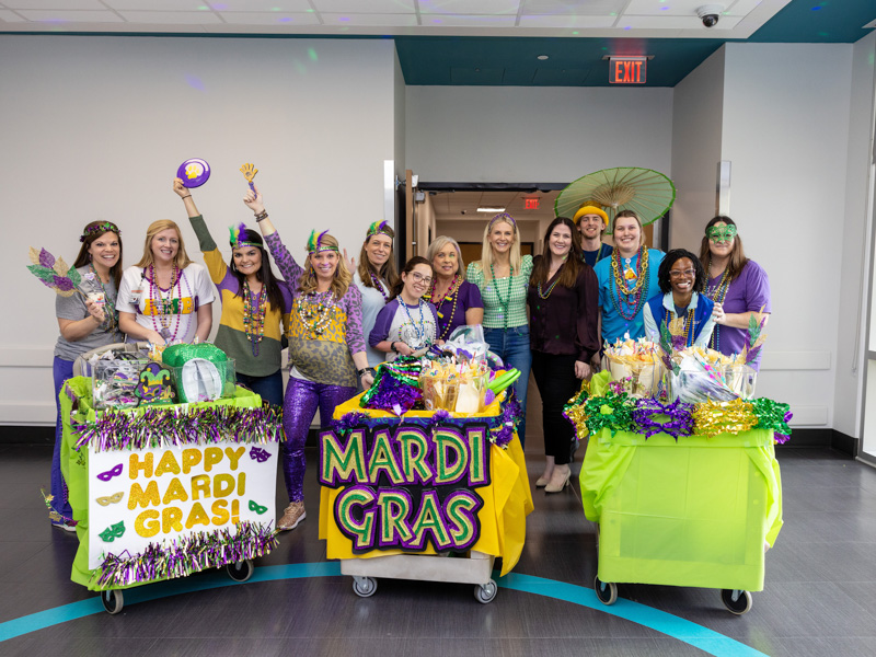 Friends of Children's Hospital and the child life team of Children's of Mississippi brought Mardi Gras fun to patients Tuesday afternoon. Jay Ferchaud/ UMMC Communications 