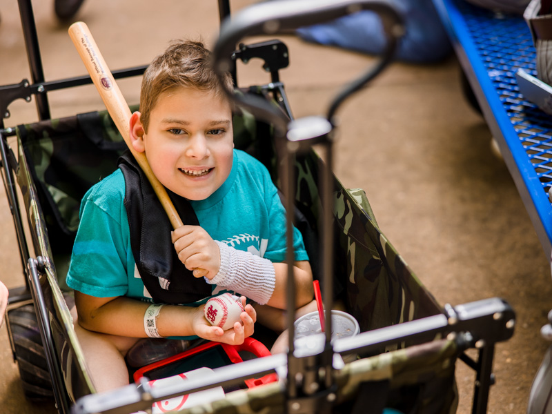 Children's of Mississippi patient Kannon Mosley of Collinsville shows his Mississippi State baseball swag. Lindsay McMurtray/ UMMC Communications 