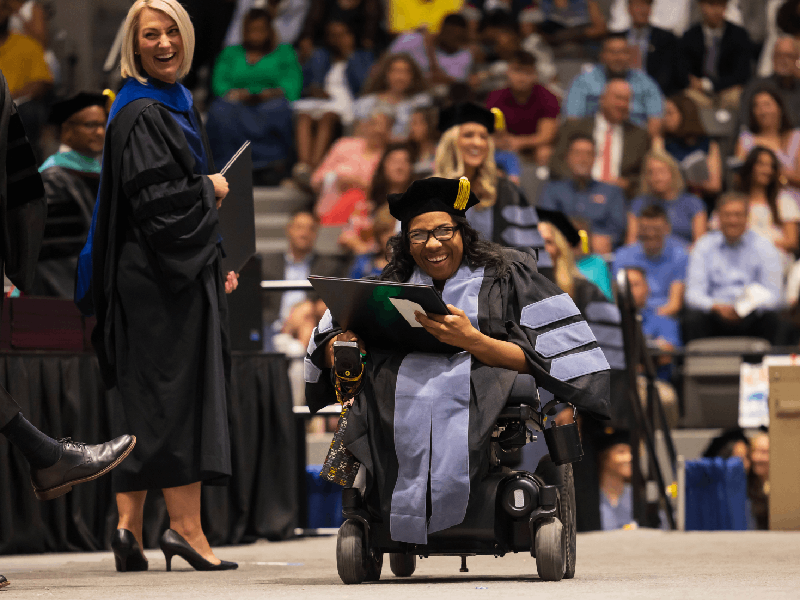 Miracle Buckley celebrates graduation with a doctor of occupational therapy from the School of Health Related Professions.