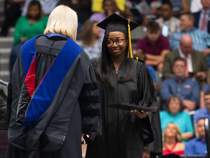 La'Quita Minor receives her Bachelor of Science in Health Informatics and Information Management degree from the UMMC School of Health Related Professions. Melanie Thortis/ UMMC Communications 