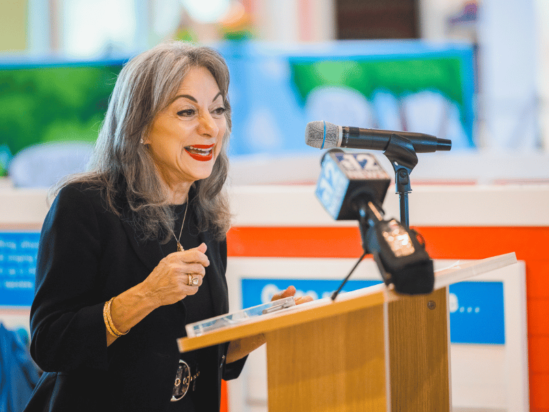 Dr. Susan Buttross, professor of pediatrics at UMMC, tells news conference attendees about the importance of early childhood development through reading. Lindsay McMurtray/ UMMC Communications