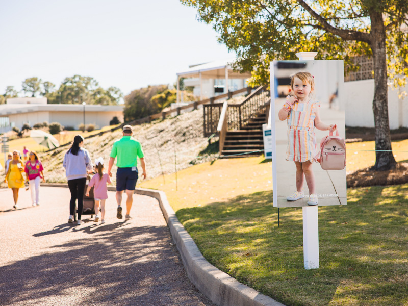 Signs featuring Children's of Mississippi patients such as Vivi Hebert were featured throughout the Country Club of Jackson during the Sanderson Farms Championship. Lindsay McMurtray/ UMMC Communications