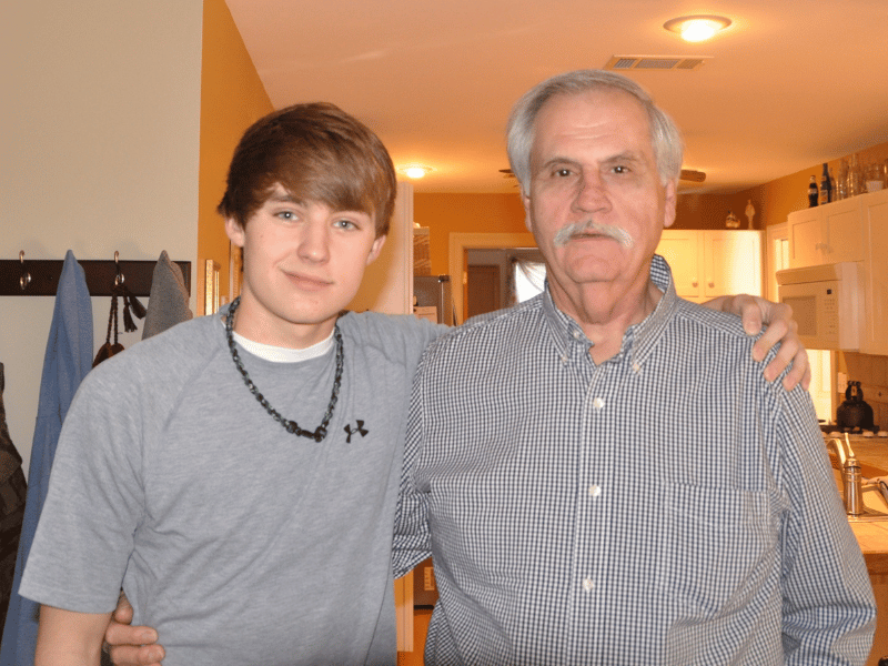 Thomas Moore, who is 14 here, spends time with the man whose words would get him through medical school years later. (Photo courtesy of Thomas Moore)
