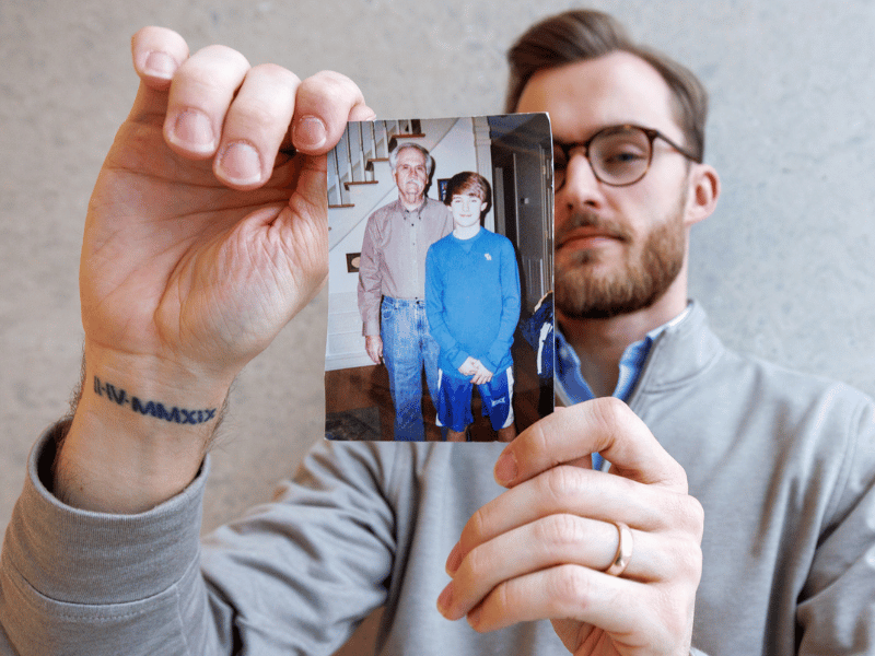 The tattoo on Thomas Moore's wrist is a reminder of "one of my best friends," as is the photo he's holding.