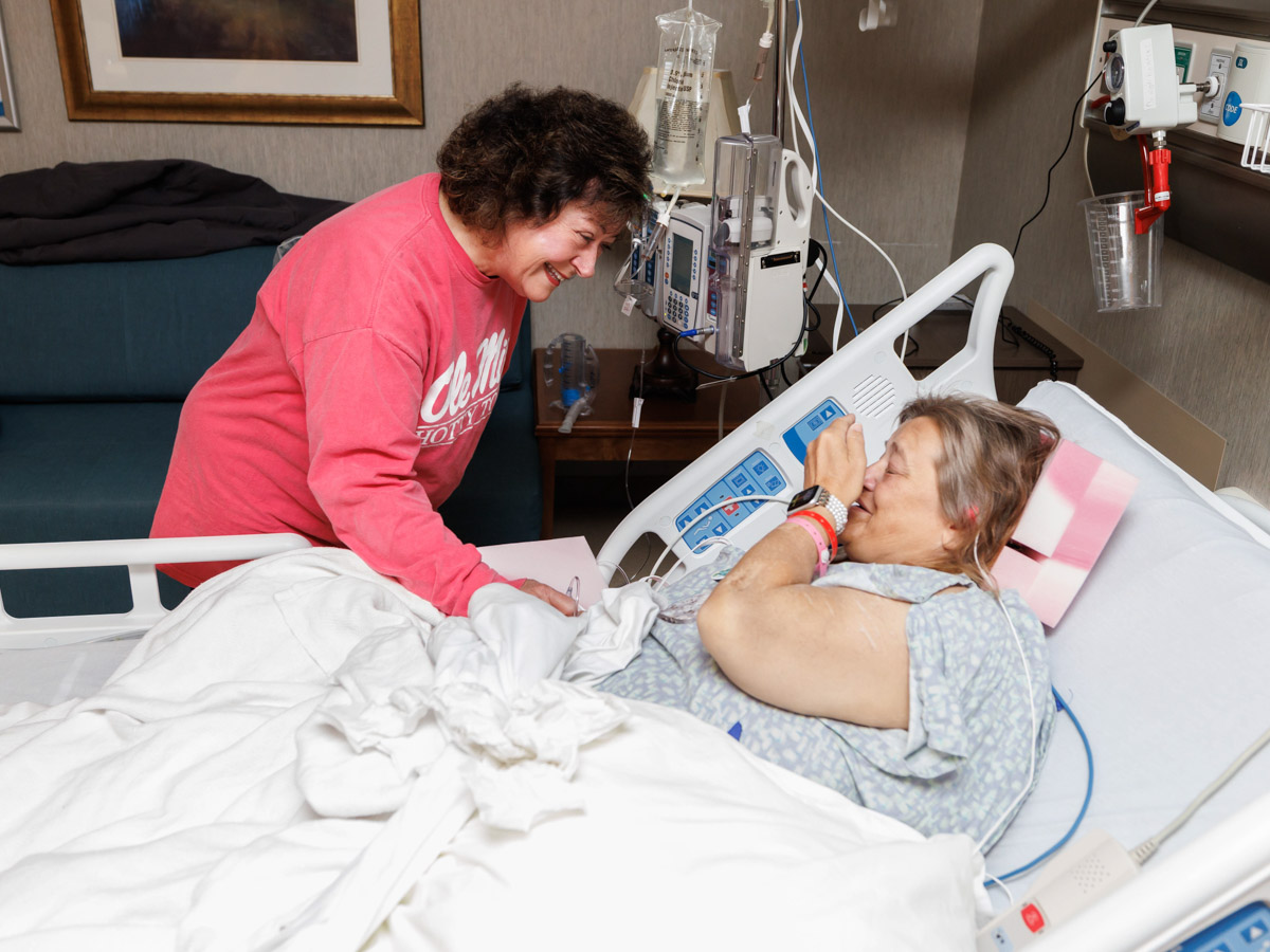 Kidney recipient Linda Boone meets her donor, Rosemary Windham, for the first time.