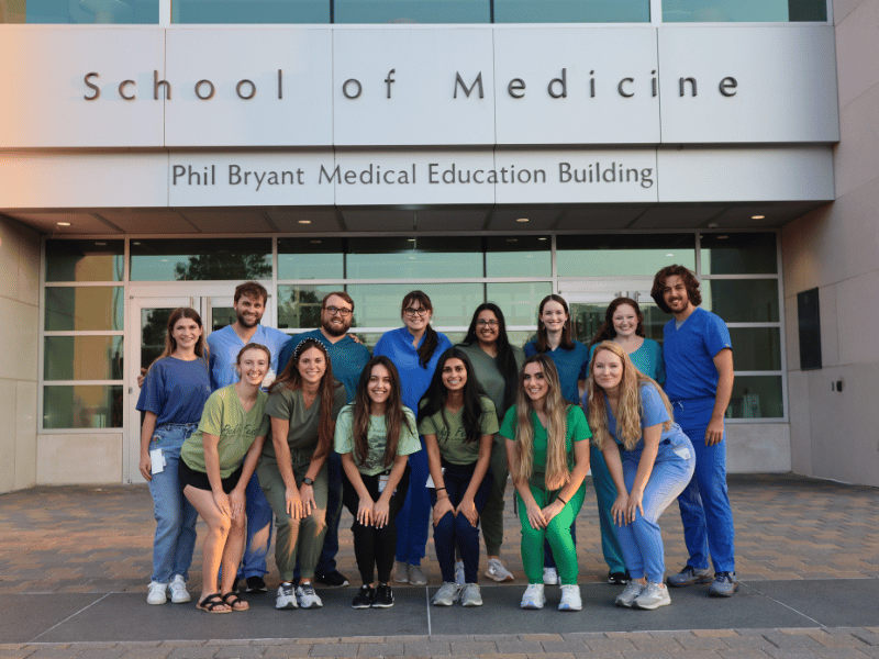 Operations directors for the Student Health Coalition are, from left: front row, Karson Pettit, M3; Grace Howell, M2; Mina Motakhaveri, M3; Zainab Ahmad, M3; Isabella Kelly, M3; and Kaitlyn Barber, M1; back row: Katelyn Powell, M3; Joe Natalizio, M3; Justin Cantrelle, M3; Jordan White, M3; Simmi Kaur, M2; Jessica Jasper, M2; Meagan Cantrelle, M3; and Shade Smith, M2. (Photo courtesy of the Student Health Coalition)