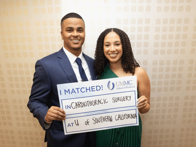 Medical student Eric Lucas and his fiance, Marissa Anderson, smile after Match Day. Melanie Thortis/ UMMC Photography 