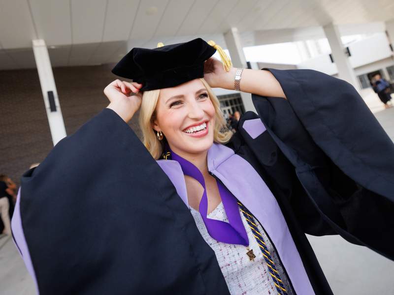 As befits her imminent career, Doctor of Dental Medicine graduate Beth Shiyou Dunmire is all smiles. Joe Ellis/ UMMC Communications 