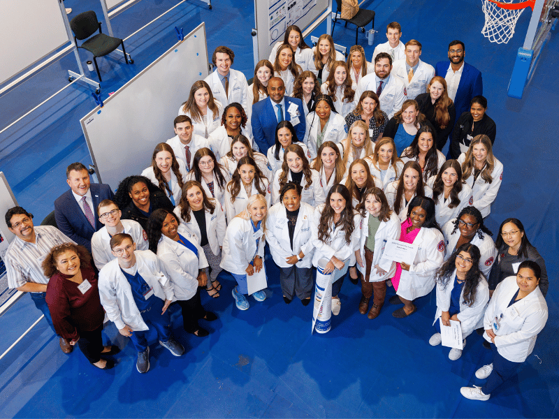 Participants who placed in this year’s School of Health Related Professions Research Day gather after the program. Jay Ferchaud/ UMMC Communications 