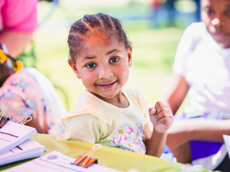 Marley Dozier smiles at the registration table.