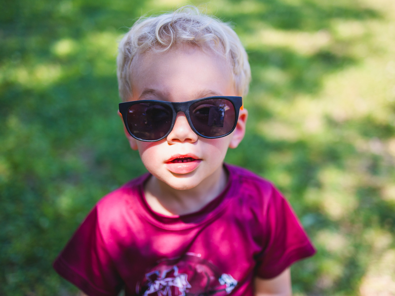 Sage Coomes tries on a pair of Children's of Mississippi sunglasses, one of the treats for Back-to-School Health Rally attendees.