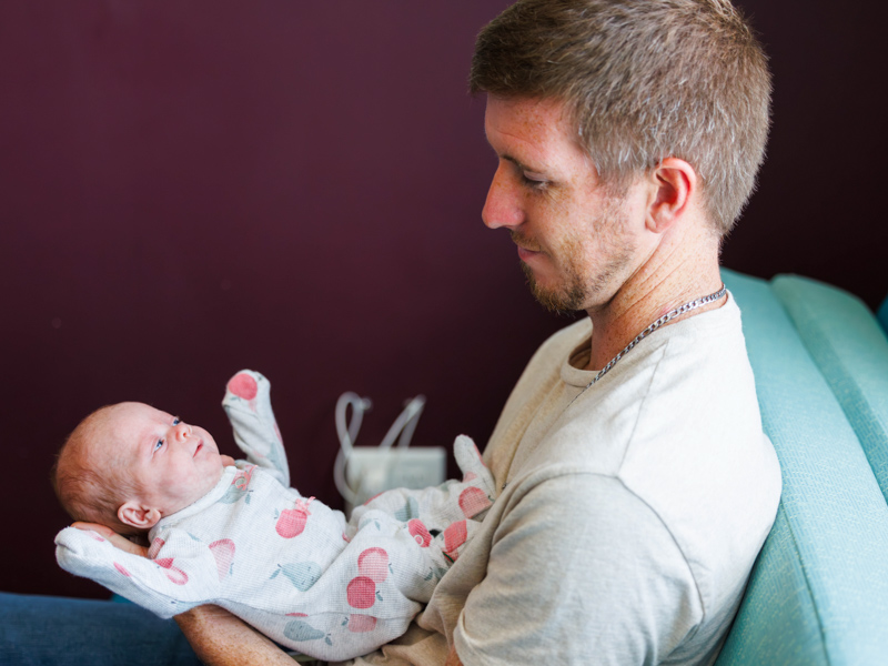 Tyler Meyers holds daughter Allie Ray just before she was discharged from neonatal intensive care. Melanie Thortis/ UMMC Communications