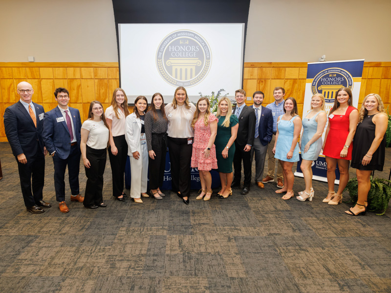 UMMC Honors College inductees pictured with Dr. Scott Rogers are, from left, Tyler Thibert, Crislyn Cole, Abbey McCrory, Payton Ryals, Alexandra Wolfe, Kaitlyn Quick, Sarah Davis Baker, Olivia Jennings Austin, Kaleb Thompson, Daniel Young, Luke Alexander, Madison Beets, Madelaine Palen, Katlyn Garner and Riley Huckaby.