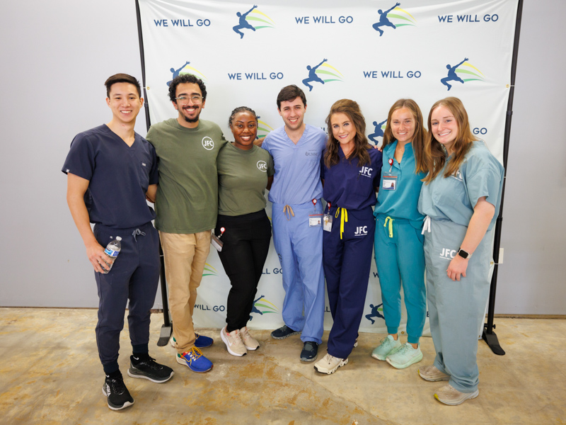 The We Will Go contingent includes, from left, medical students, Jim Yen, M4; Rohinton Dossabhoy, (gap year student); and M2s Natasha Burrell; John Ligon, Anna Lee Bullock, Camille Couey and Mary Peyton Passons.