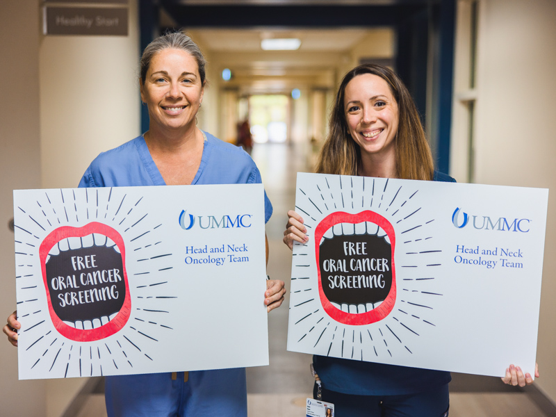 Dr. Lana Jackson, left, professor in the Department of Otolaryngology-Head and Neck Surgery, and Dr. Anne Kane, an assistant professor in the department, were among caregivers staffing free oral cancer screenings in 2023.