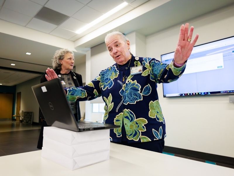 Fran Malenzi, Nursing Magnet Program director, prepares to hit the "send" button.