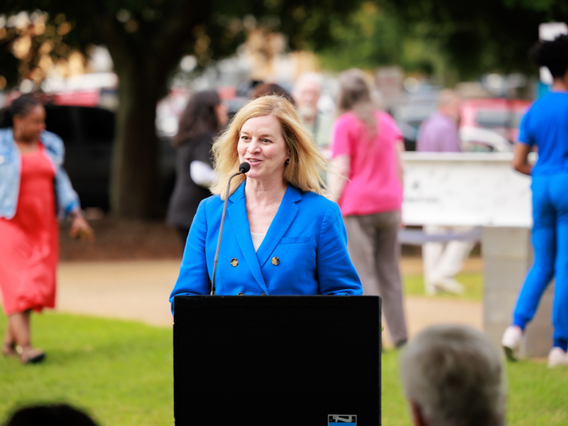 Dr. Tina Martin, dean of the UMMC School of Nursing, welcomes attendees to the School of Nursing topping-out ceremony. Joe Ellis/ UMMC Communications