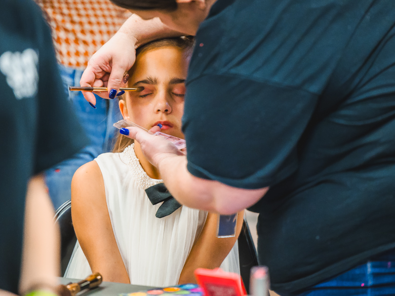 Children's of Mississippi patient Emma Eubank gets a touch of eye shadow.