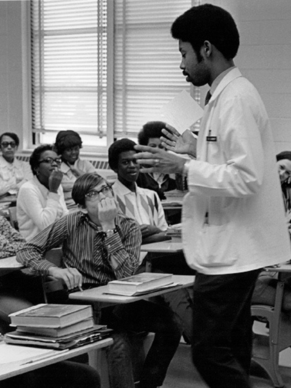 Dr. Will Searcy instructing students.