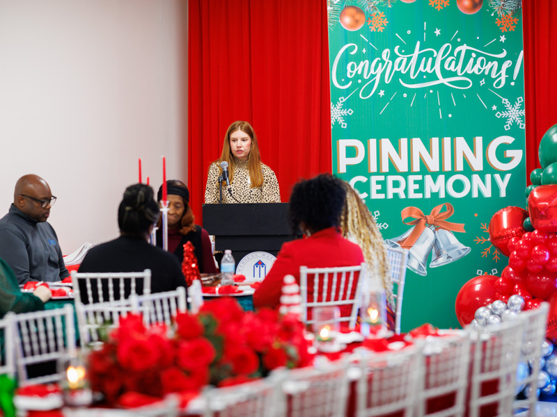 Brittany Tichenor, tobacco treatment specialist, speaks during ACT Center pinning ceremony.