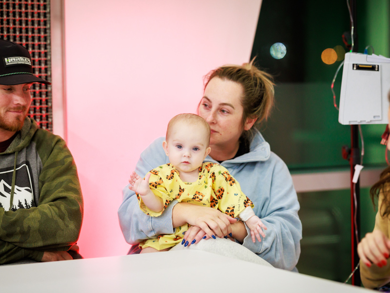 Blakely Reel, Children's of Mississippi patient, enjoys the festive sights and sounds during Light-a-Light. Joe Ellis/ UMMC Communications