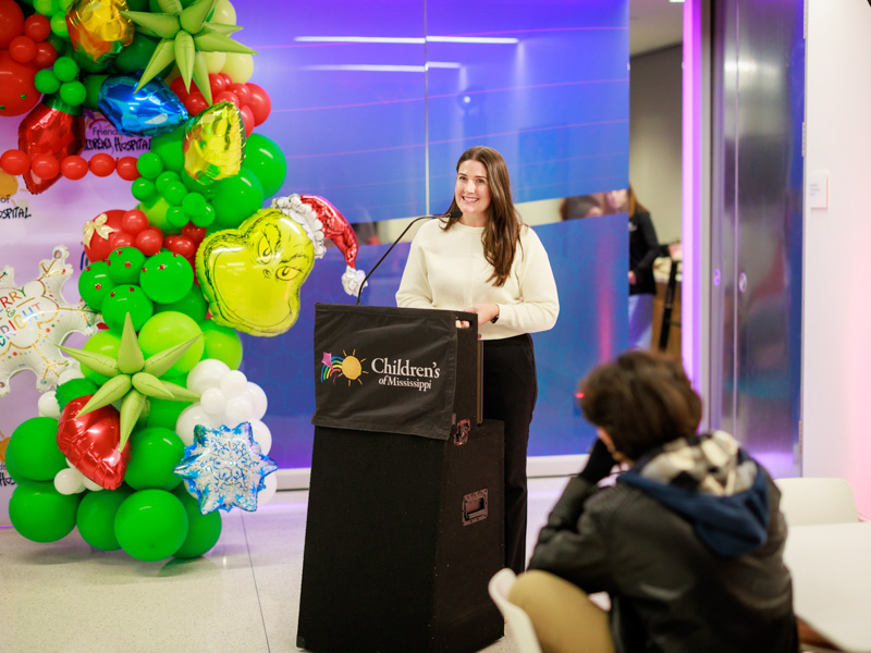 Caitlin Foreman, executive director of Friends of Children's Hospital, welcomes the crowd to Light-A-Light. Joe Ellis/ UMMC Communications