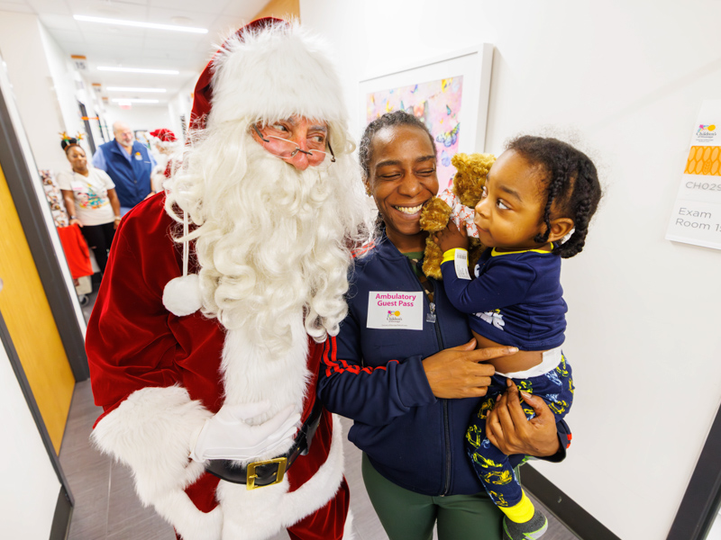 Prince Kenerson, 2, of Centreville, meets Santa Claus at Children's of Mississippi. Melanie Thortis/ UMMC Communications