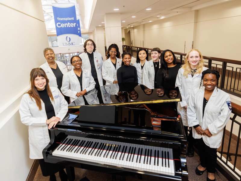 Hansen, from left, conductor of the Cantus Medici choir, is seen with fellow members Marilyn Harrington, Micaela Shields, Aiden Leise, Jordan Hart, Iesha Smith, Kaya Marascalco, Nellie Massey, Tierra Cooper, Olivia Bridges and Ta’Dashia Flowers.