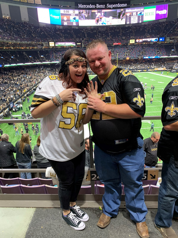Ramsey shows her engagement ring after now-husband Mickee popped the question during a New Orleans Saints game.