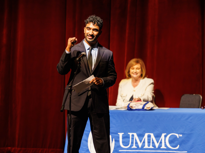 Advait Praveen announces his match in internal medicine at UMMC during School of Medicine Match Day ceremonies.