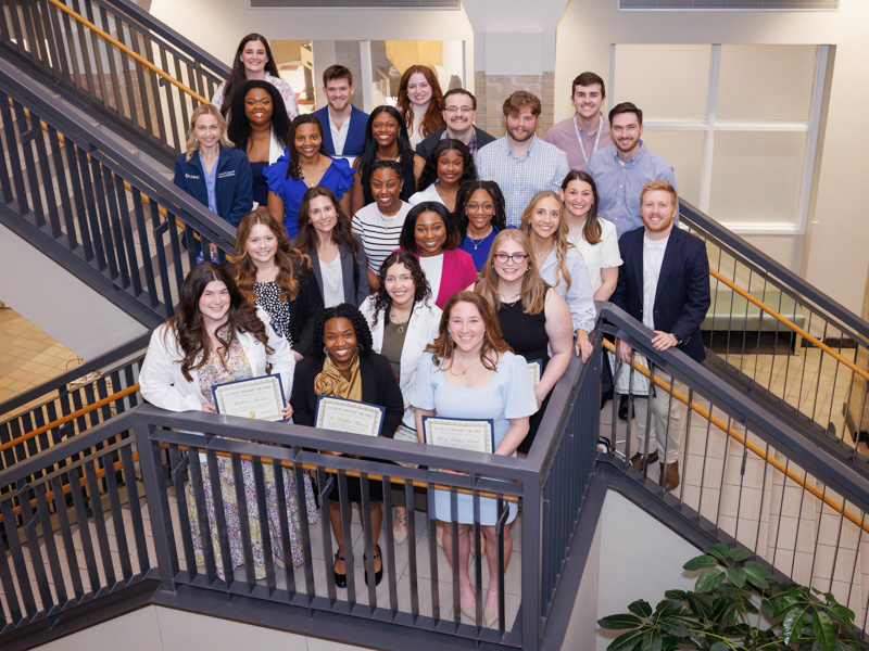 The medical students who are winners of one year cost-of-attendance scholarships display their certificates during the Feb. 20 Rural Medicine Education Symposium.