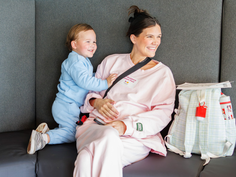 Bain Brandon, 2, patiently waits with his mom Marlee Brandon to see Dr. Sukumaran, pediatric endocrinology, at the children's hospital.