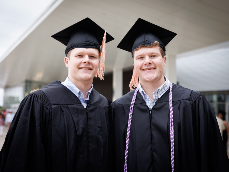 Colton and Carson Yoder celebrated earning their bachelor’s degree in nursing. Jay Ferchaud/ UMMC Communications