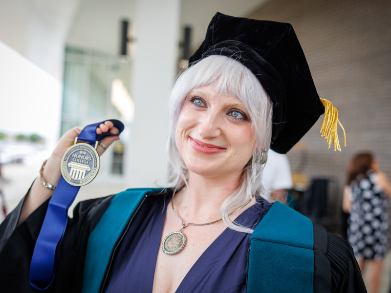 Physical therapy graduate Sarah Katherine Steward displays her Honors College medal.