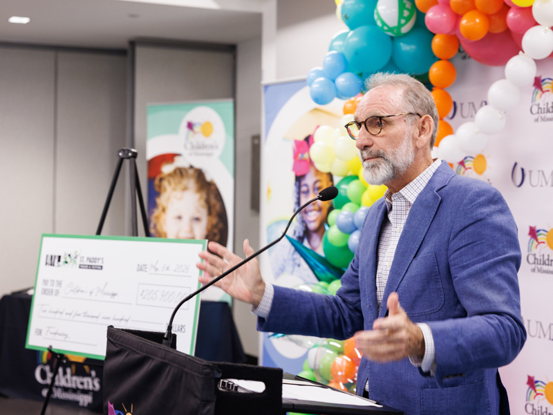 Malcolm White, founder of Hal's St Paddy's parade and festival, thanks the crowd for their continued support of the parade to benefit the children's hospital.