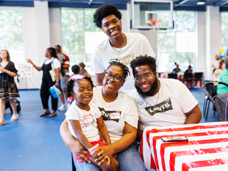 Three-year-old Makenzie Rucker celebrates NICU reunion day with her parents, Pam and Malcolm Rucker, and brother, Tylen Jones. Makenzie spent two months in the NICU at Children's.