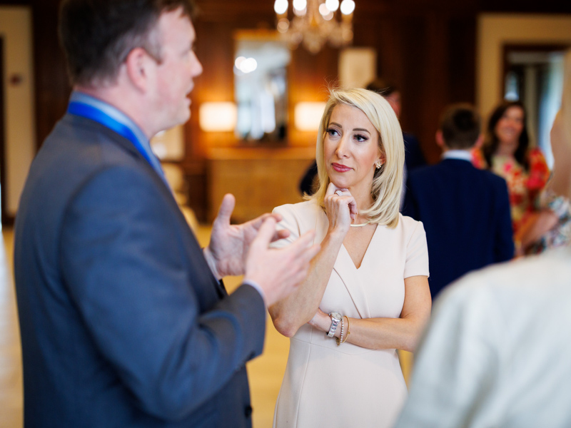Leslie Baskin, granddaughter of Mary Ann and H.F. "Mac" McCarty and secretary of the HF McCarty Jr. Family Foundation, chats with Dr. Brad Ingram at the McCarty Chair of Neurology endowment celebration.